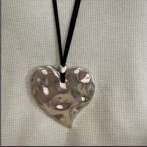 NWT Heart silver tone pendant with long black leather cord. 31" + 2" extender.